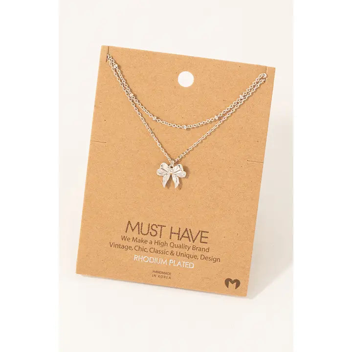 Gold Dipped Knotted Ribbon Bow Pendant Necklace