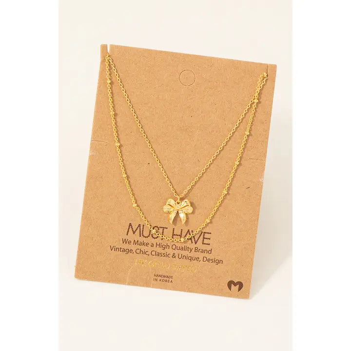Gold Dipped Knotted Ribbon Bow Pendant Necklace