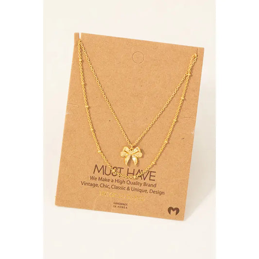 Gold Dipped Knotted Ribbon Bow Pendant Necklace